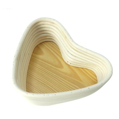 China Viable The Fine Handmade Quality Rattan Basket Restaurants Heart Shaped Bread Fermentation Basket for sale