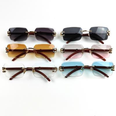 China Sports Sunglasses Brand Designer Sunglasses Men Women Wood Leg Double Bridge Square Rimless Sun Glasses  UV400 Fashion Driving Glasses for sale