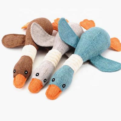 China Educational Plush Dog Toys Goose Healthy Molar Training Educational Pet Squeaky Toy for sale