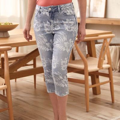 China Light blue breathable custom logo all over tropical plant printed many-leg stretch women straight denim 7/8 jeans for sale