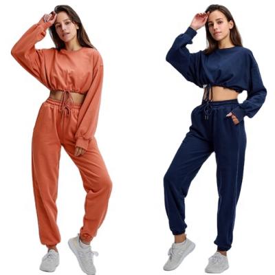 China 2021 Manufacturer Breathable Women Clothing Two Pieces Crop Top And Pants Set Custom Cropped Tracksuit Set for sale