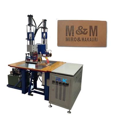 China High Frequency Hotels Double Heads Fabric Leather Manual Hydraulic Embossing Machine for sale