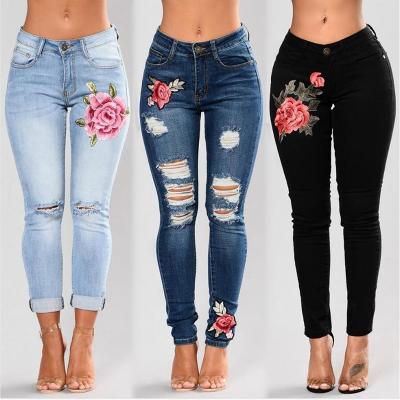 China Anti-Wrinkle Anti-Wrinkle 10% Off Slim Pants Autumn Elastic Flower Jeans Female Denim Pants Rose Pattern Hole Ripped Stretch Embroidered Jeans for sale