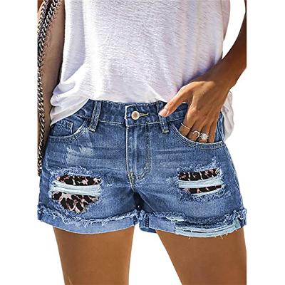 China Factory wholesale women's fashion breathable denim shorts distressed leopard print denim shorts women's jeans for sale