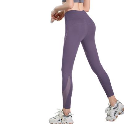 China Lady Fitness Yoga Leggings With Pocket Proof Breathable Warm Squat Tights Gym Quick Dry Yoga Pants for sale