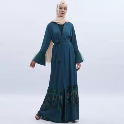 China Polyester 2021 Summer Muslim Women's Dresses Hem Arabic Tassel Sparkle Sequins Solid Color Plus Size Custom Clothing Factory Direct for sale