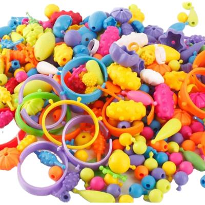 China Cartoon DIY Toy Noise Beads Wholesale Educational Toys Plastic Noise Beads For Kids Girls Jewelry Making for sale