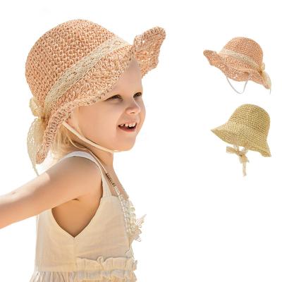 China 2021 New Image RTS 2021 Bowknot Bowknot Kids Hat Kids Wide Brim Sunscreen Breathable Beach Hat Foldable Weave Straw Hat for sale