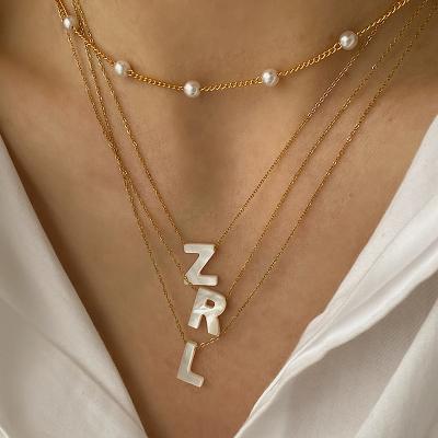 China Direct Deal High Quality Gold Plated Stainless Steel Chain Bead Necklace 26 Letter Shell Pendant Necklace for sale