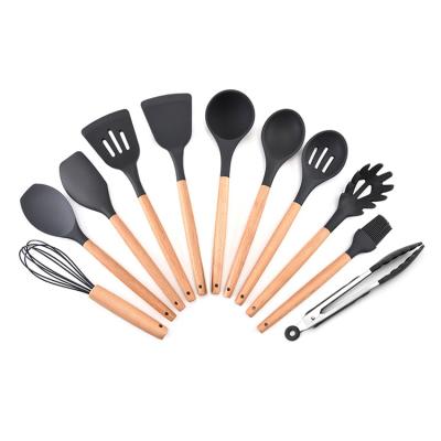 China New Product Reusable Ins Style Reusable Silicone 12 Piece Kitchen Utensil Set With Wooden Handle With Stand for sale