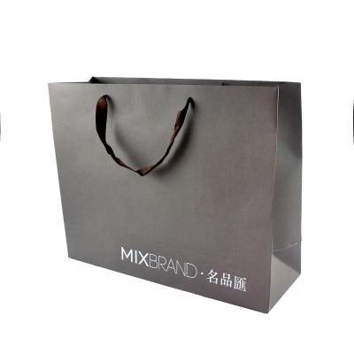 China Recycled Materials Custom Size Paper Handle Paper Bag Kraft Paper Shopping Bag silver colour for sale