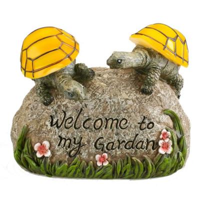 China Europe Garden Statue Resin Turtle Solar Powered Home Figurines On Stone Garden Light Decor for sale