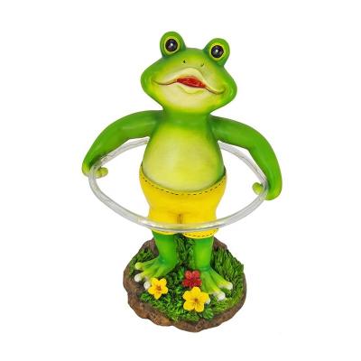 China Cute Europe Garden Figurine Animal Sculpture In Decorative Solar Frog Statue With Solar LED Lights for sale