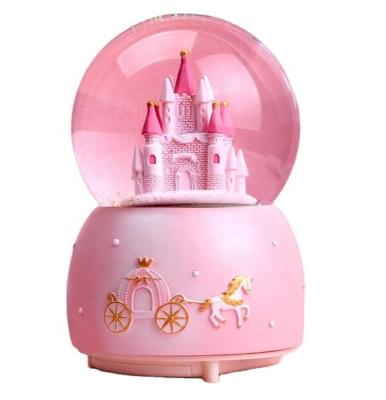 China Custom Resin Castle Snow Globe Europe Unique Resin Snow Globe Pink Castle for sale