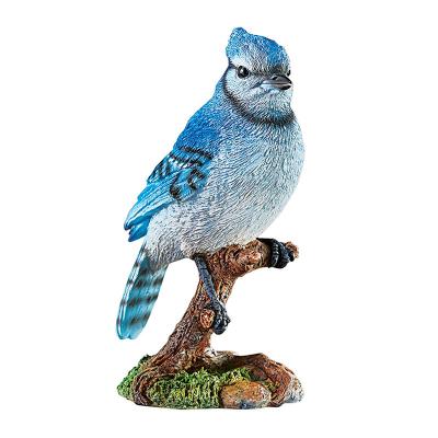 China Lifelike Blue Europe Jay Bird Figurine Polyresin Animal Statues On Stump For Home Decoration for sale