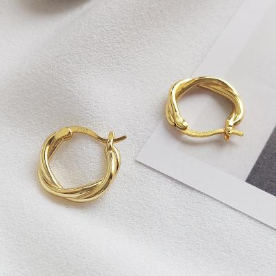 China Wholesale 18k Gold And Silver Cute 925 Sterling Silver Gold Women Party Twist Earrings Retro Cold Wind Circle Earrings for sale