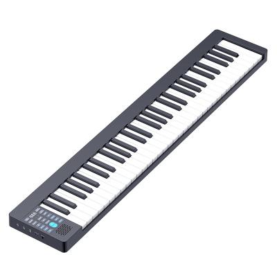 China 2022 Hot Sale Silica Gel 61 Keys Portable Electronic Piano Keyboard with Speakers Rechargeable Battery Foot Pedal Piano Travel Bag for sale