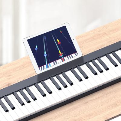 China Silica Gel Best 49 Key Portable Electric Keyboard Piano For Newest Portable Piano With Power Supply, Sheet Music Support And Simply Piano App for sale