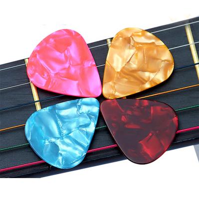 China Plucking String Amazone Instruments Printing Colorful Design Picture Guitar Picks Hot Sale OEM 0.46mm 0.71mm 0.88mm 0.96mm 1.2mm 1.5mm for sale