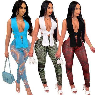 China Pants 2022 QUICK DRY multi color tight two piece set printed high waist pants women crop tops and pants for women for sale