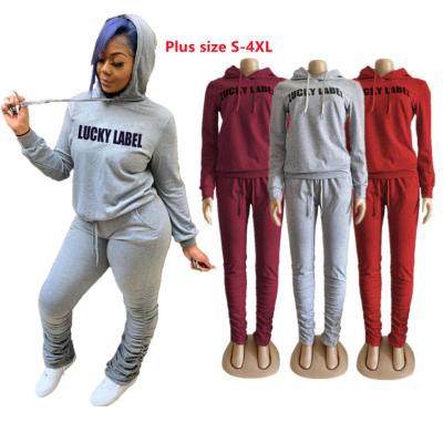 China Breathable Women Joggers Set Plus Size Long Sleeves Printing Lucky Label Sets Stack Pants 2 Piece Set for sale