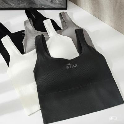 China New Solid Color One Piece Sports Bra Radio Lift Up One Piece Seamless Bra For Woman for sale