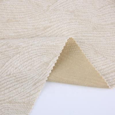 China Free sample stretch soft hand feeling core spun yarn wicker jacquard elastic knitted knitting fabric for sale