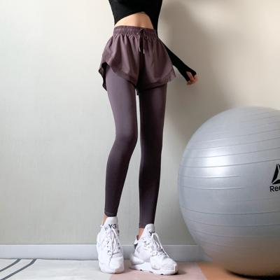 China Two Piece Quick Dry Active Stretch Leggings Women Tight Pants Fake Breathable Fitness Running Yoga Gaiters for sale