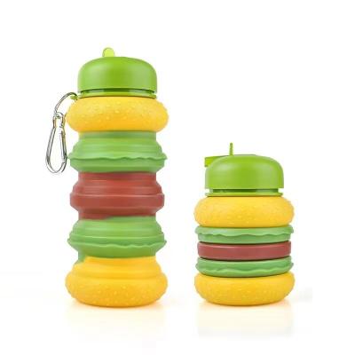 China Doughnut Collapsible Water Bottle For Kids 19oz BPA Free Leakproof Silicone Rainbow Water Bottles For School Students for sale