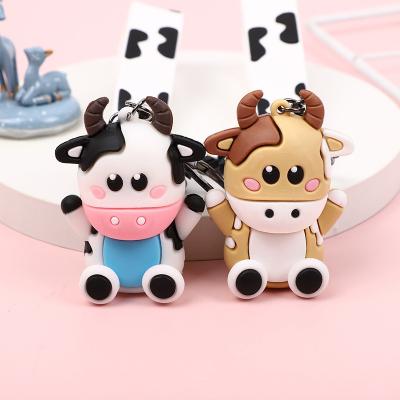 Chine Chaîne de clés de vache de dessin animé en silicone pour sac à dos et pendentif de voiture pour femmes à vendre