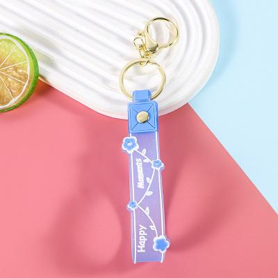 China Soft And Bpa Free Silicone Keychain Pendants Wrist Keychain Bracelet Gifts for Girls for sale