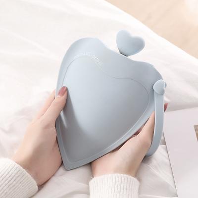 China Love Small Silicone Hot Water Bottle Bag With Knited Cover For Pain Relief Waist Back Neck Menstrual Cramps for sale