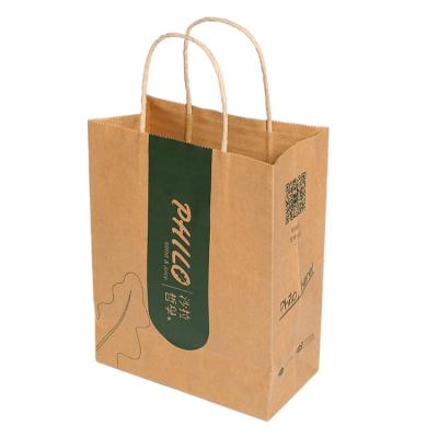 China Luxury Custom Brown Kraft Paper Gift Bag Christmas Kraft Paper Bag With Handle for sale