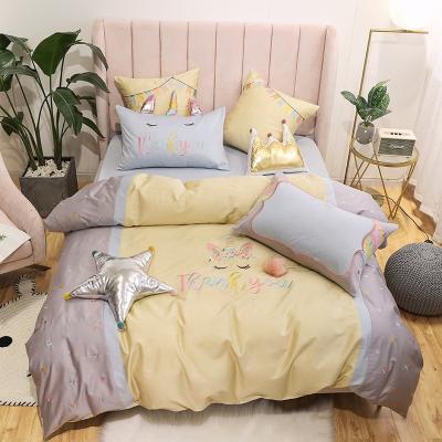 China Luxury Yellow Folded Unicorn Satin Embroidery Designers Style Sheet Kids Bedding Sets European Duvet Cover for sale