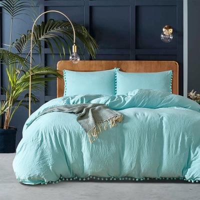 China Nondisposable Hot Sale Plain Dyed Vintage Washed Bedding Sets 100% Polyester Pillowcases And Duvet Cover With Little Cute Ball for sale