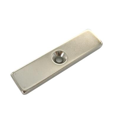 China Industrial Strong Magnet 60x15x5mm Block Neodymium Magnet With Countersunk Hole for sale