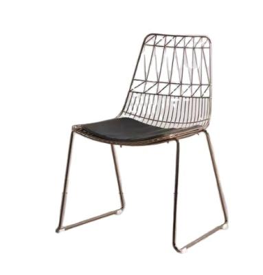 China Stackable Modern Metal Frame Gold Iron Steel Mesh Wire Dining Chair for sale