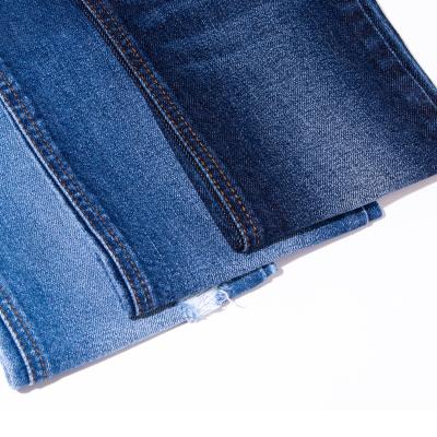 중국 63 Percent Cotton Indigo Denim Fabric Sustainable Skinny Women'S Jeans Fabric 판매용