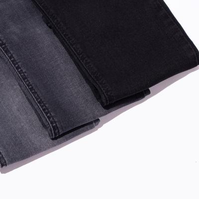 China Mercerized Twill Denim Fabric Black 66% Cotton 28% Polyester 1 3 Right Hand Jeans Fabric for sale