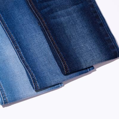 China Hot selling twill weave 66% cotton 29% polyester 3% viscose indigo grey jeans fabric for sale