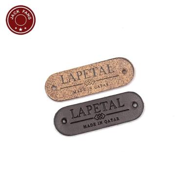 China Viable Custom Self Adhesives Emboss Iron On 3D Logo Real Leather Labels Patch for sale