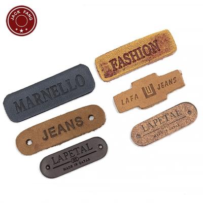 China Viable Custom Made Embossed Genuine Leather Cloth Metal Real Genuine Leather Embossed Rubber Leather Patch With Iron for sale