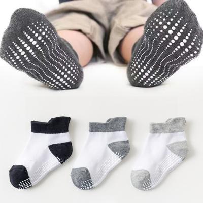 China New Antibacterial Spring Cotton Uron Socks Seven Solid Color Non-slip Baby Socks High Quality Kids Socks for sale