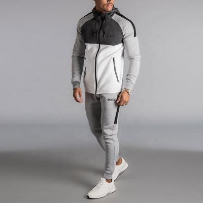 China Custom Wholesale Anti-UV Couples Gray Running Men's Logo Sports Tracksuits Mens Logo Sports Tracksuits Set for sale