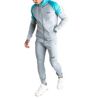 China Latest Design Anti-UV Colorblock Breathable Men Jogging Soccer Training Tech Tracksuits Sets Customized for sale