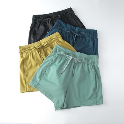 China Breathable Women Soft Loose Fit Sportswear Summer Shorts Quick Dry Cargo Gym Fitness Shorts With Pockets for sale