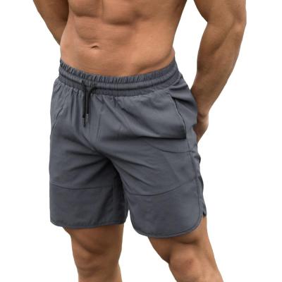 China QUICK DRY Breathable Workout Bottom Bottom Mosture Wicking Fitness Gym Wear Men's Running Shorts With Pockets for sale