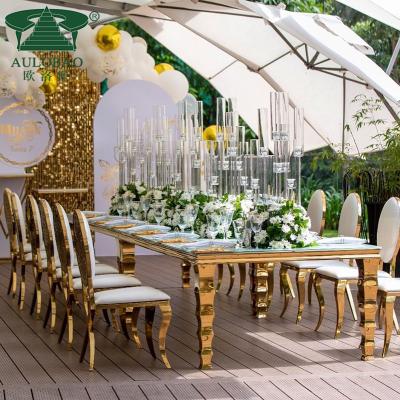 China (Other) New Arrival Adjustable Wedding Furniture Metal Trim Rectangle Dining Table With Glass Top for sale