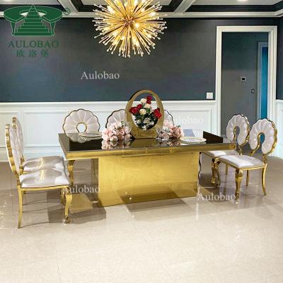 China (Other) Furniture Gold Stainless Steel Frame Most Popular Adjustable Modern Event Dining Table Set for sale