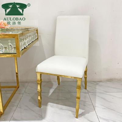 China Rent Restaurant Modern Wedding Gold Stainless Steel Leg Leather Dining Chairs for sale